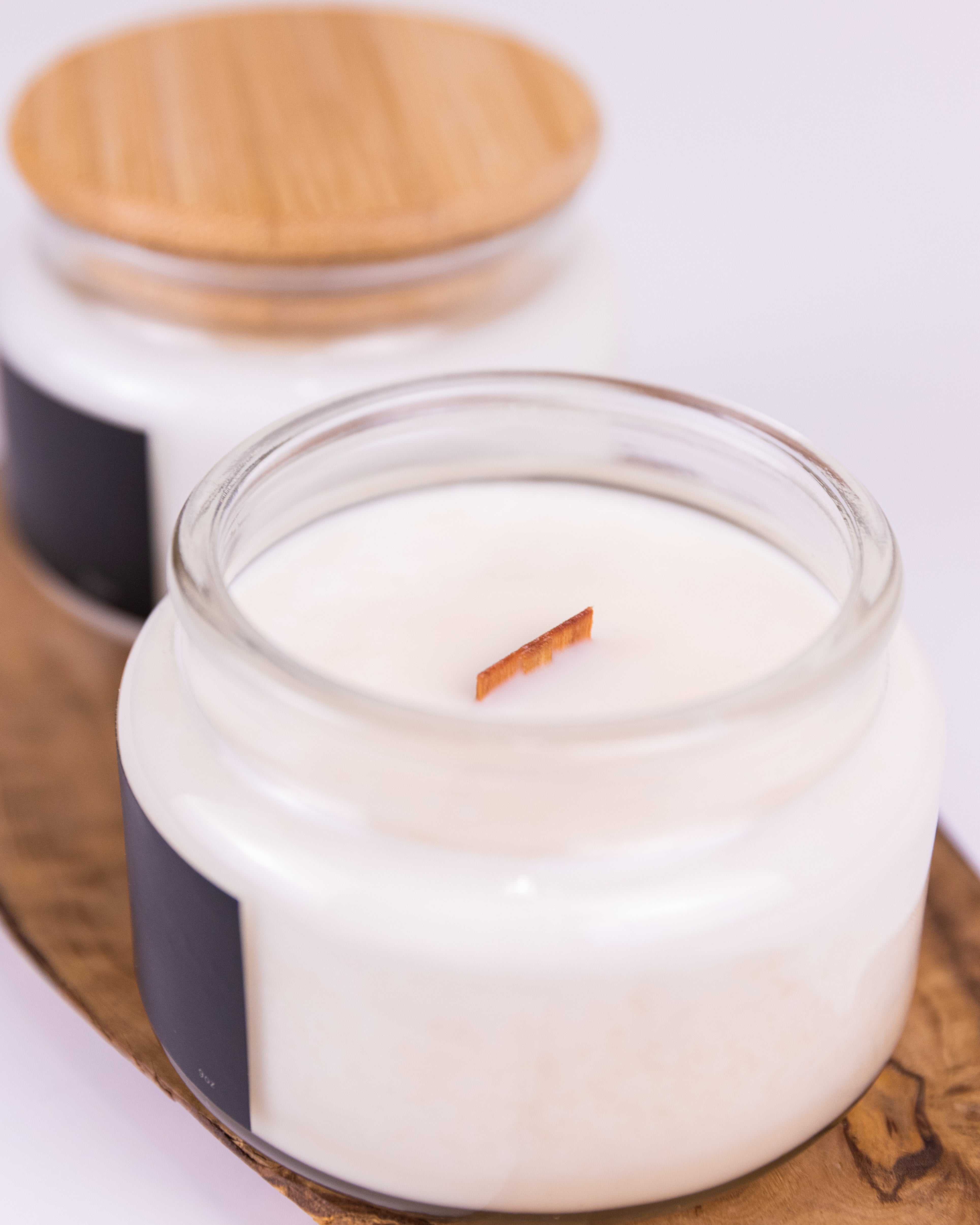Top view of a candle with wooden wick